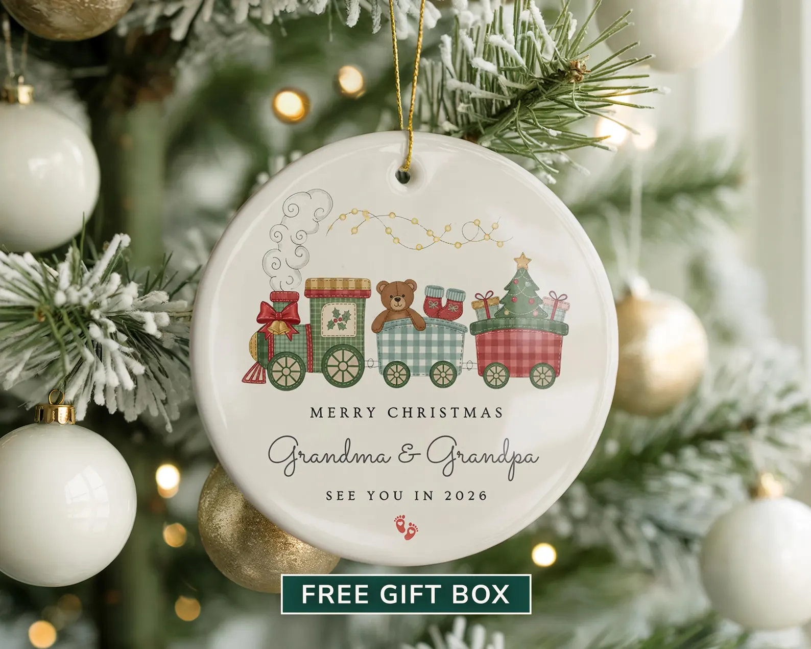 Pregnancy announcement to parents Christmas ornament hanging from a Christmas tree.