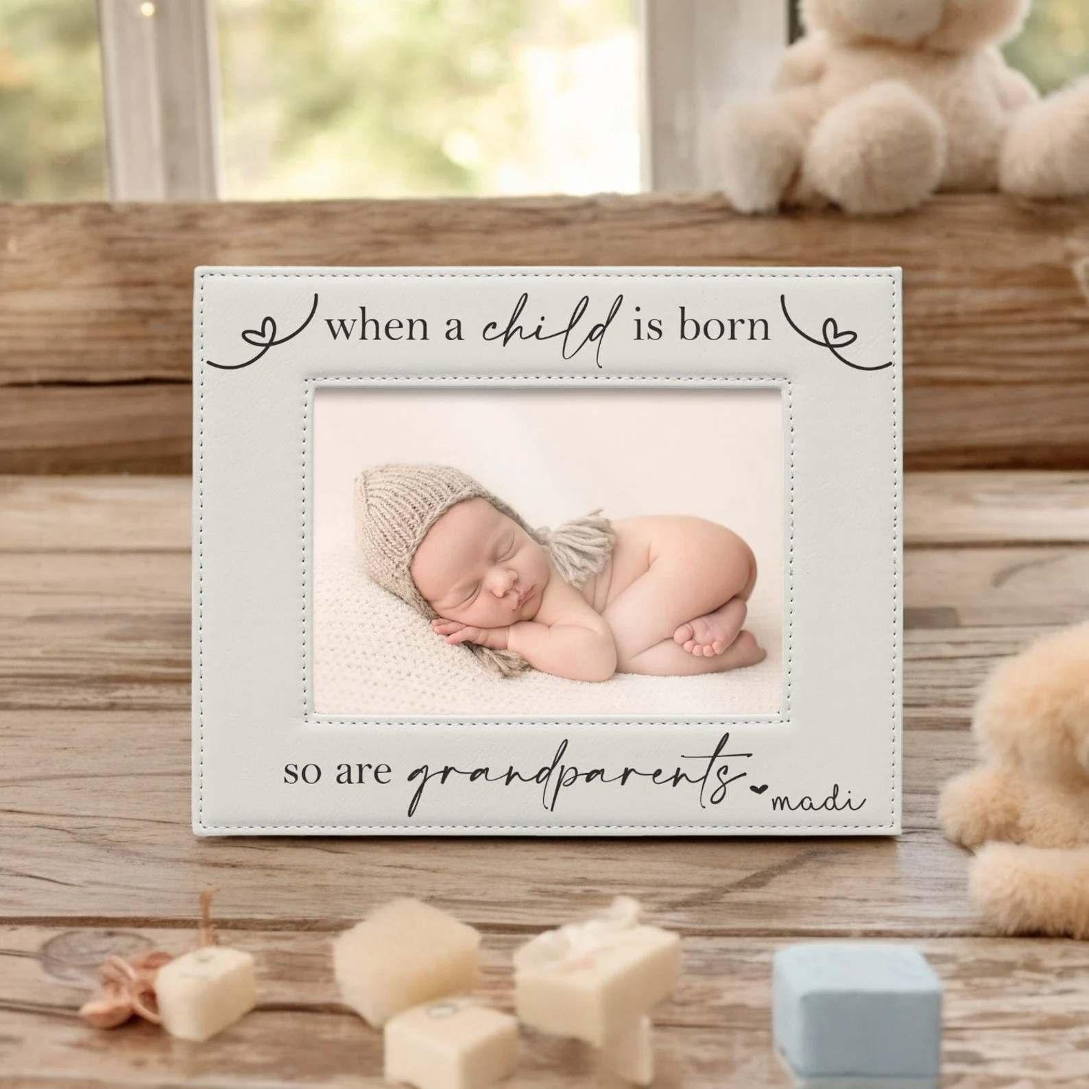 Picture frame for grandparents with the text “when a child is born, so are grandparents”