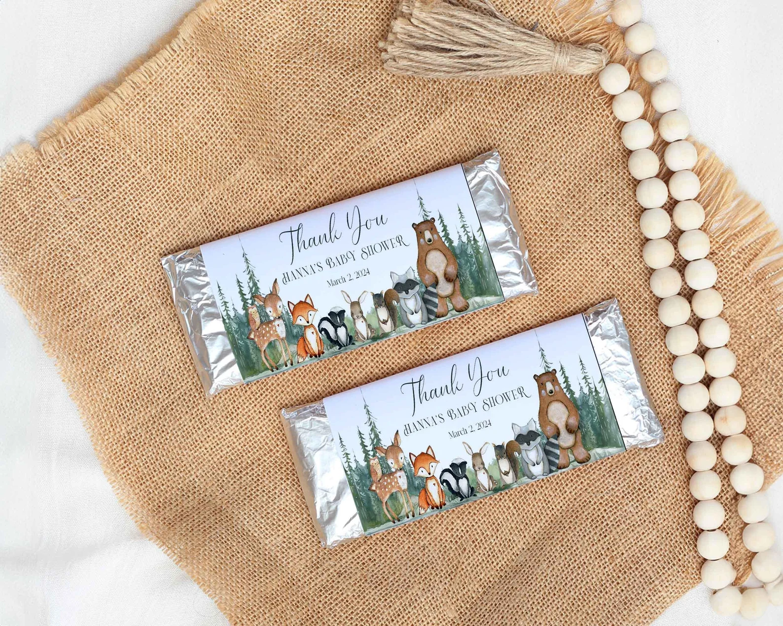 Baby shower party favor chocolate bars with custom wrappers.