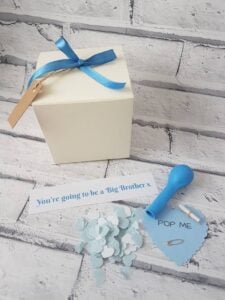 Balloon in a box pregnancy announcement