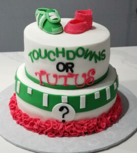 Touchdowns or tutus gender reveal cake