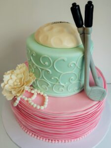 Putters or pearls gender reveal cake