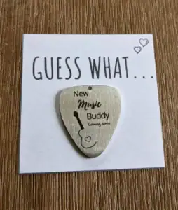 Guitar pick pregnancy announcement