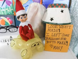 Elf making balloon animals