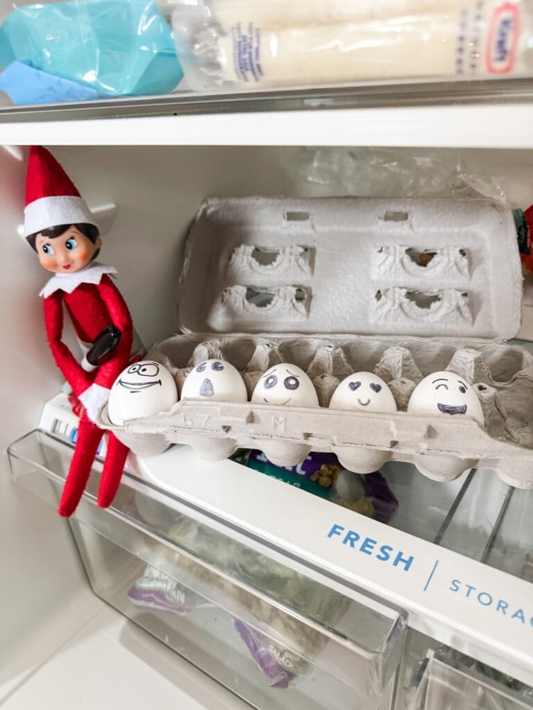Elf on the shelf draws on eggs
