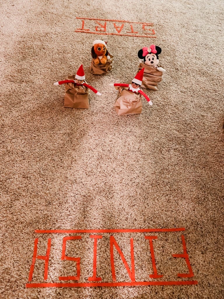 Elf on the shelf sack race with stuffed animals