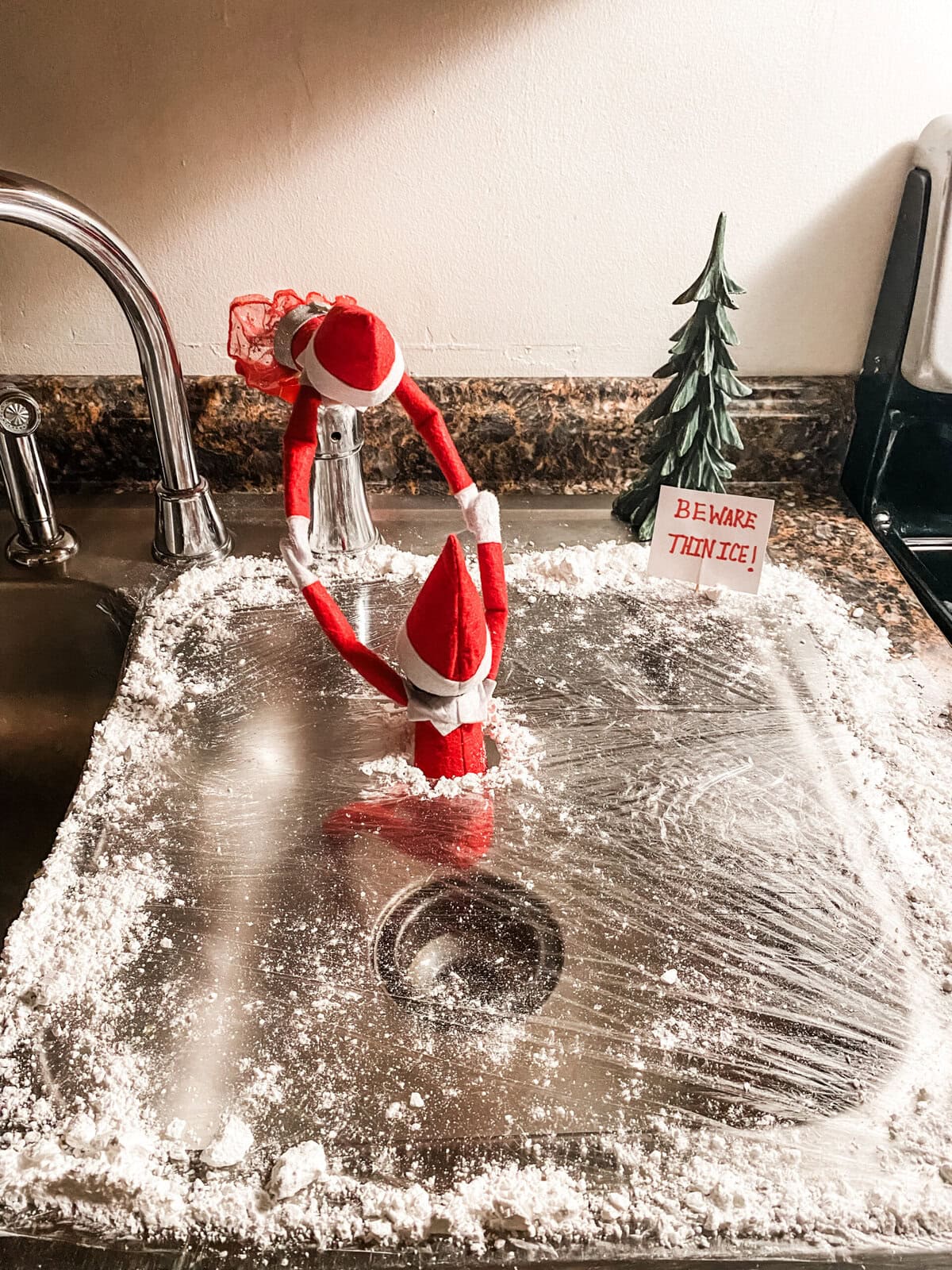 Elf on the shelf falling in ice