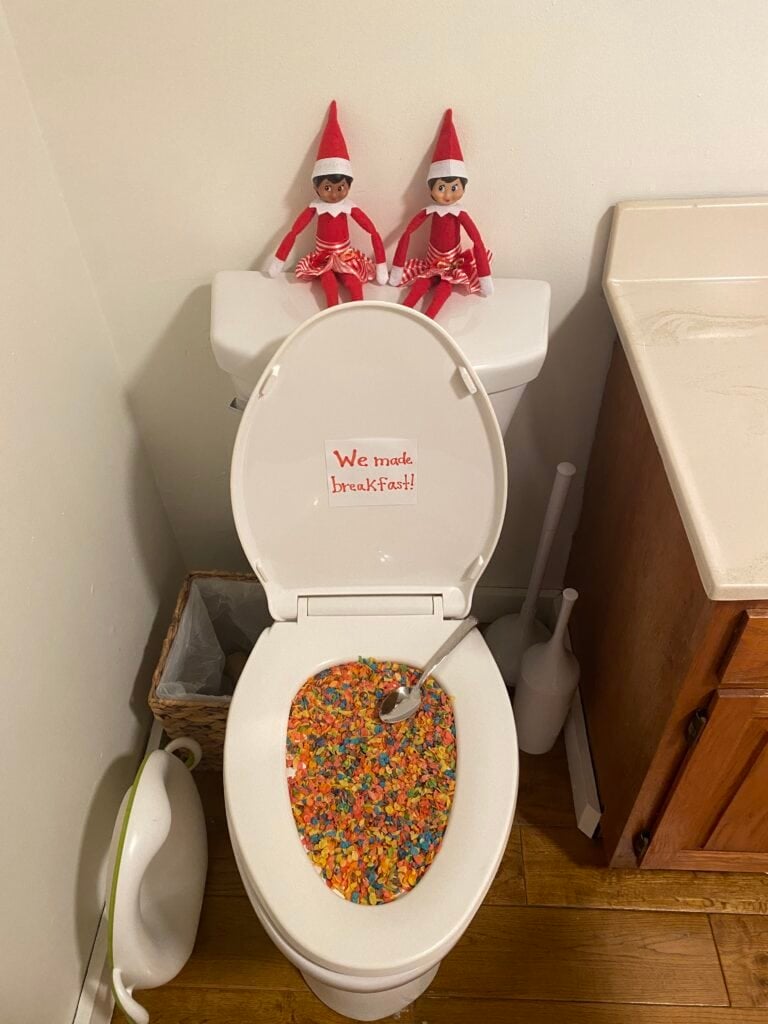 Elf on the shelf makes cereal in toilet