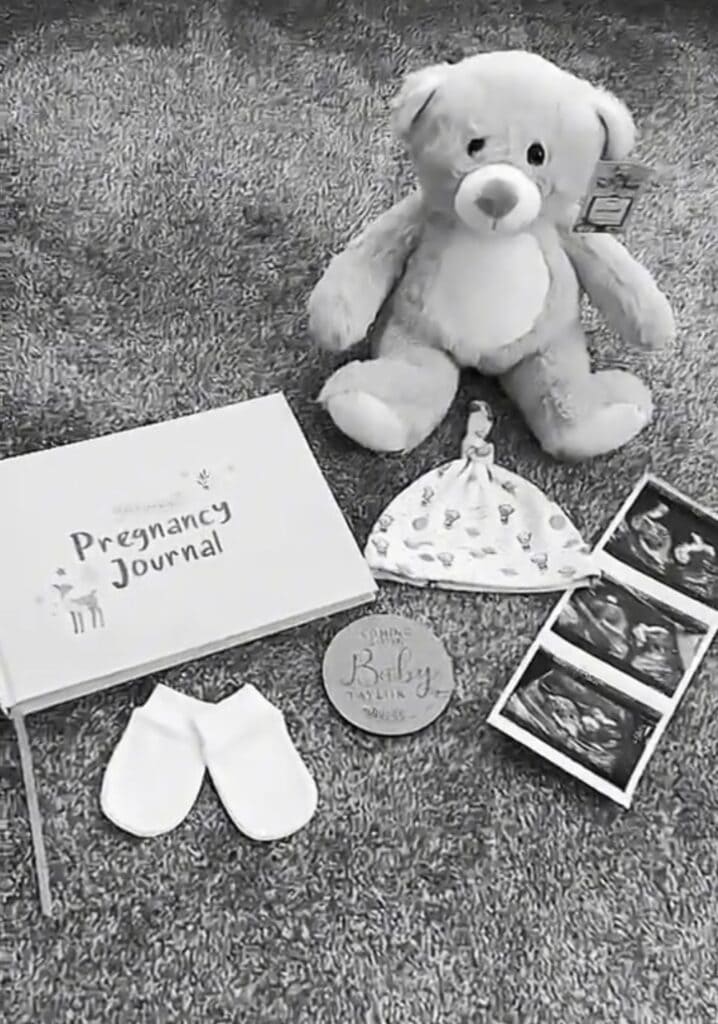 Black and white gender reveal with teddy bear