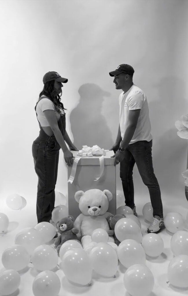 Black and white to color transition gender reveal balloons in a box