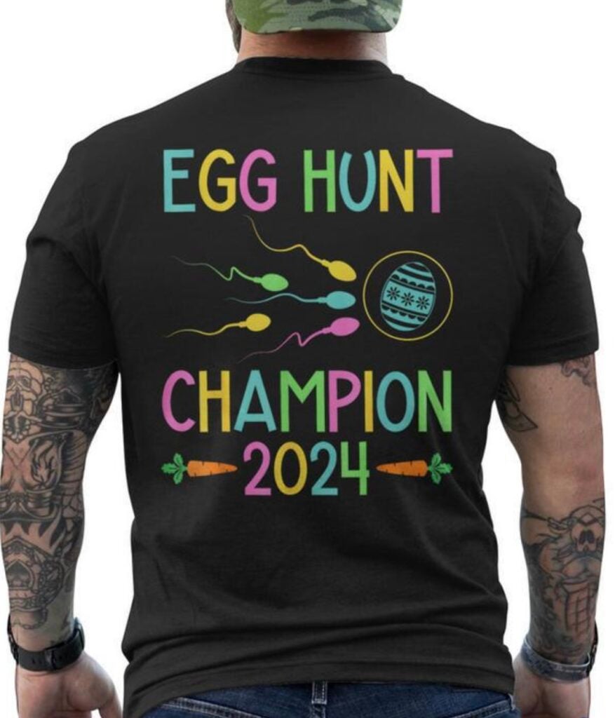 Man wearing Easter pregnancy announcement shirt that says, “Egg hunt champion 2024”