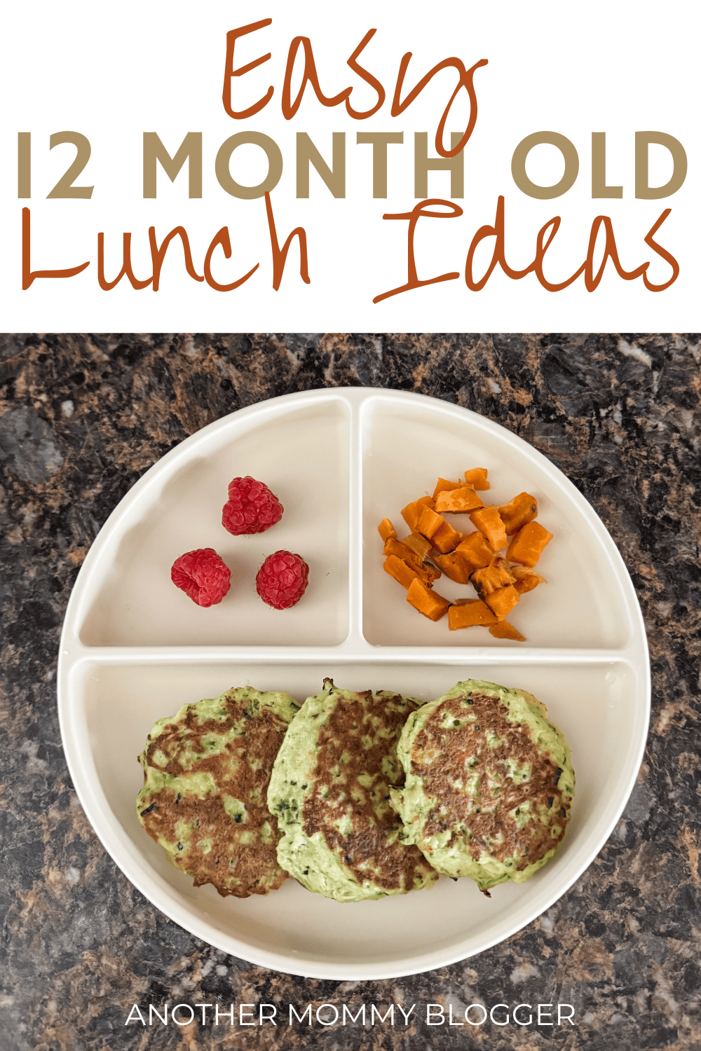 Pinterest graphic titled “Easy 12 Month Old Lunch Ideas” featuring a toddler plate with three zucchini fritters, diced sweet potatoes, and raspberries on a dark granite counter. Text overlay and blog name “Another Mommy Blogger” are included.