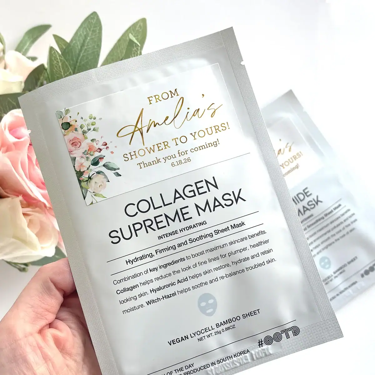 Collagen sheet mask with floral baby shower favor label that reads “From Amelia’s Shower to Yours,” ideal skincare party favor for baby showers.