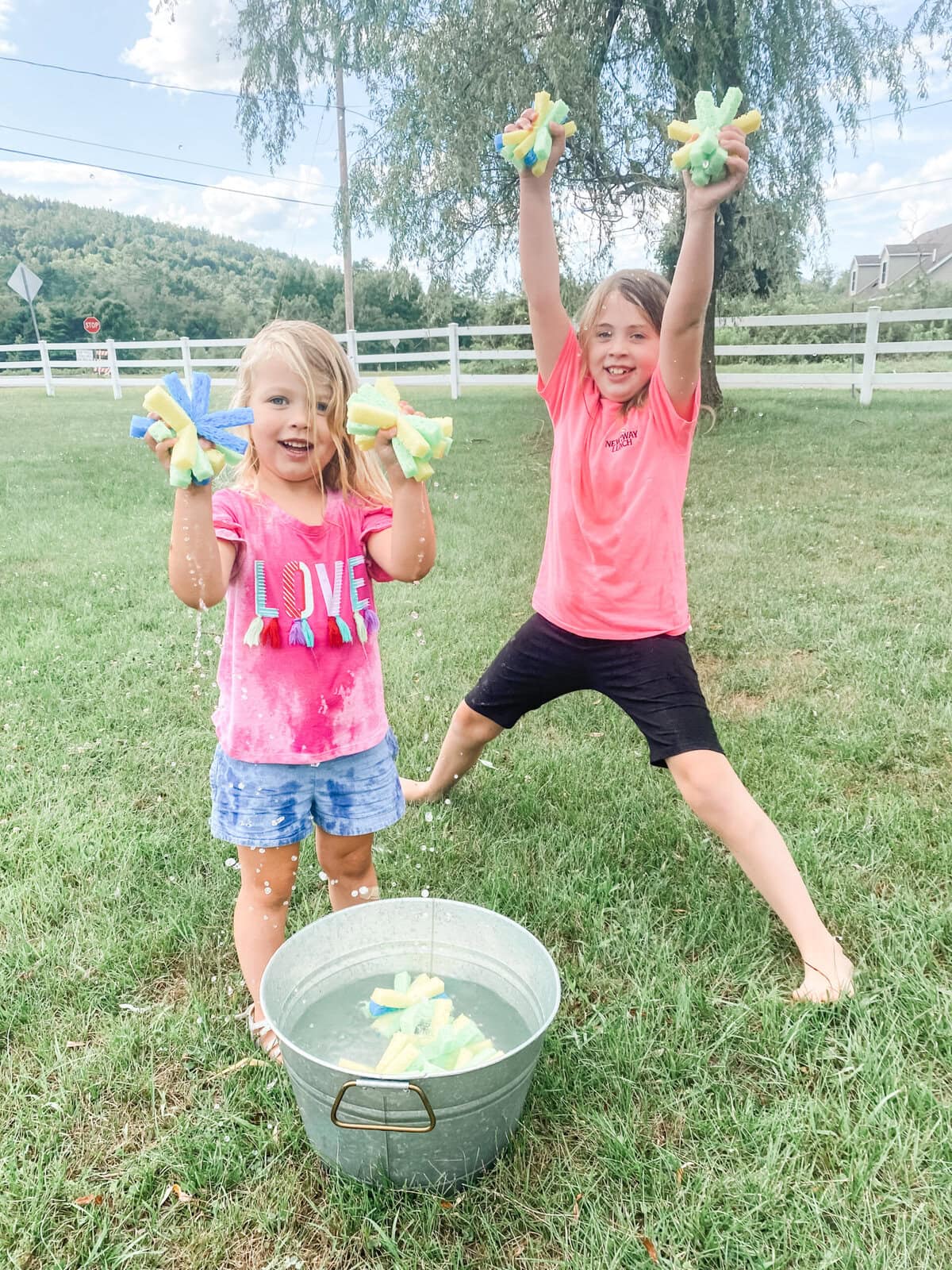Close-up of sponge balls being soaked and thrown during a water fight