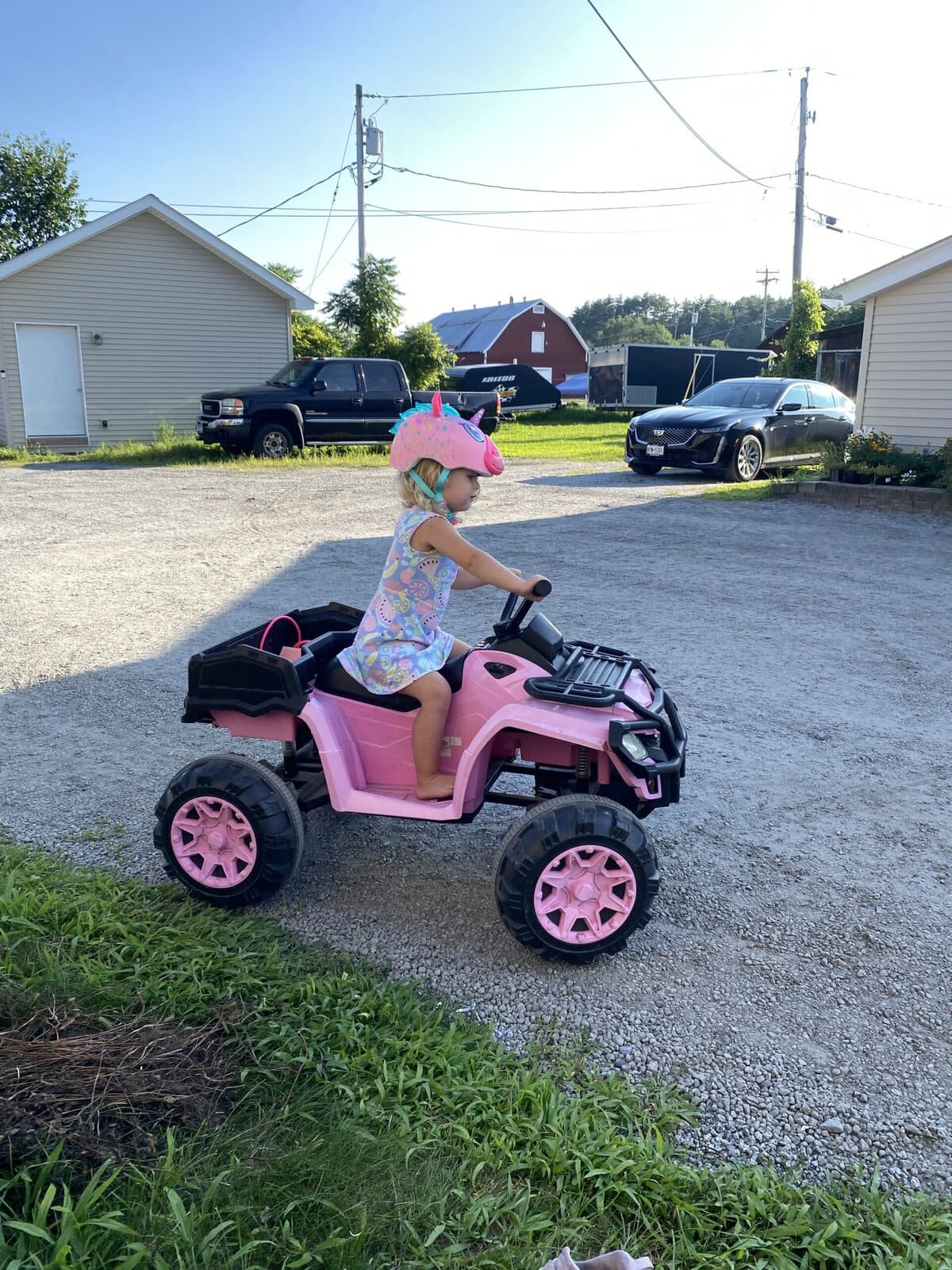 Girl riding a battery powered kids vehicle