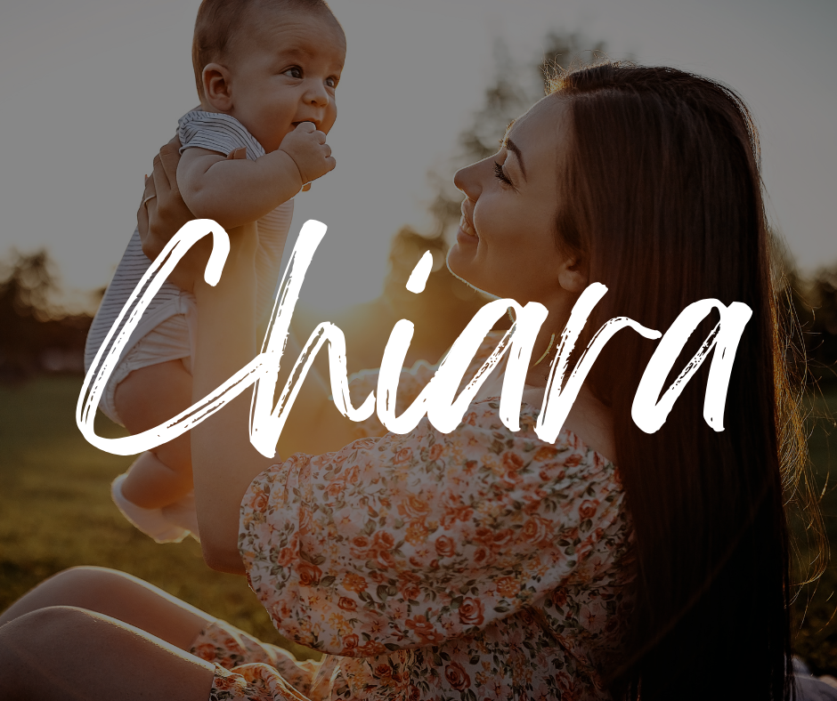 Mother in a floral dress smiling up at her baby as she lifts them in the air at sunset, with the name “Chiara” written in bold white script across the image.