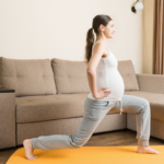 Woman staying fit during pregnancy with exercise