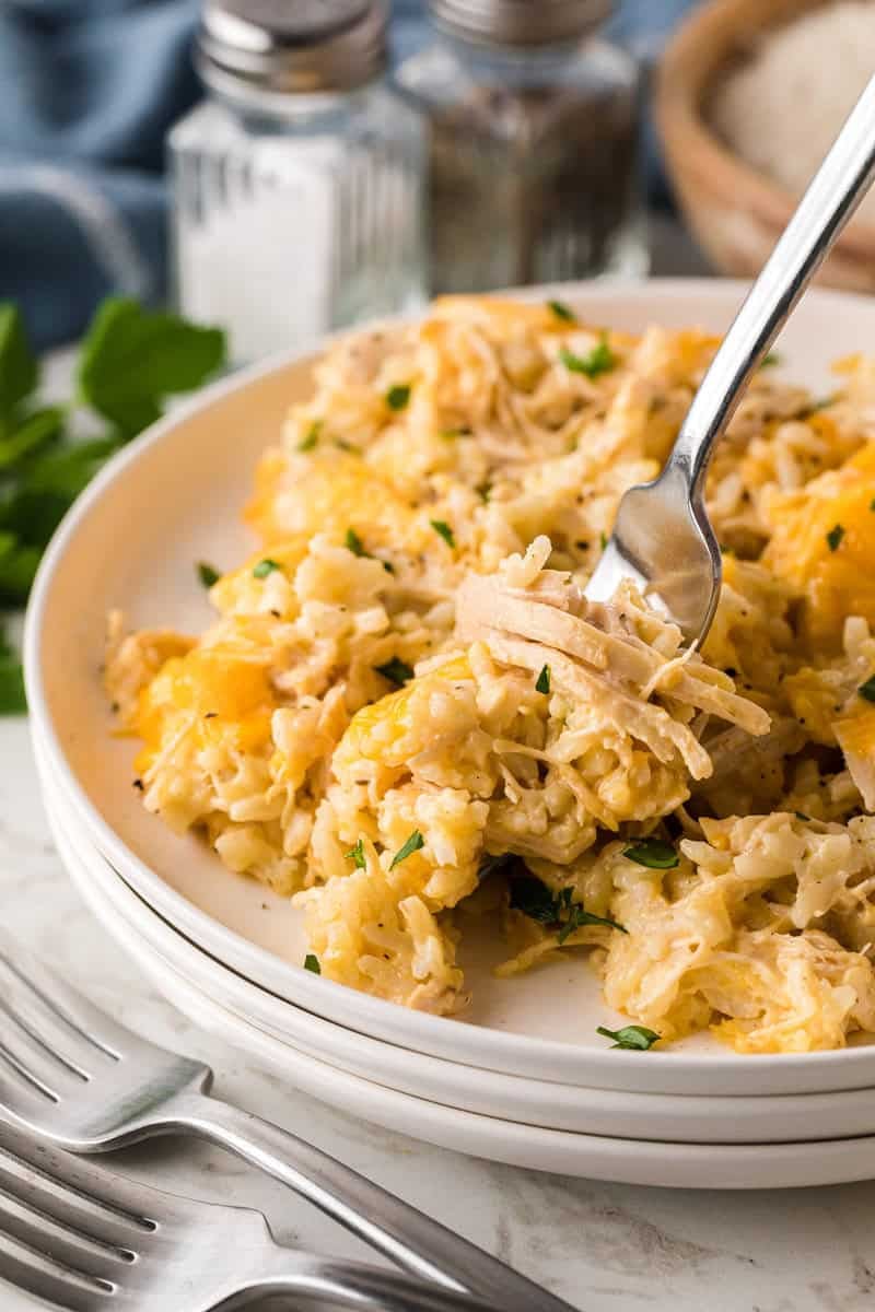 Postpartum freezer meal chicken and rice casserole with melted cheese served in bowl