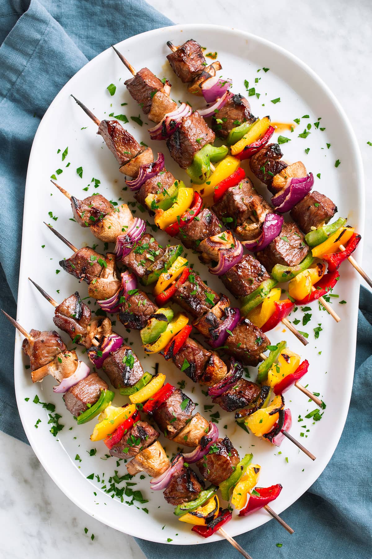 Grilled steak kabobs with marinated beef, colorful bell peppers, onions, and mushrooms, healthy dinner for gestational diabetes.