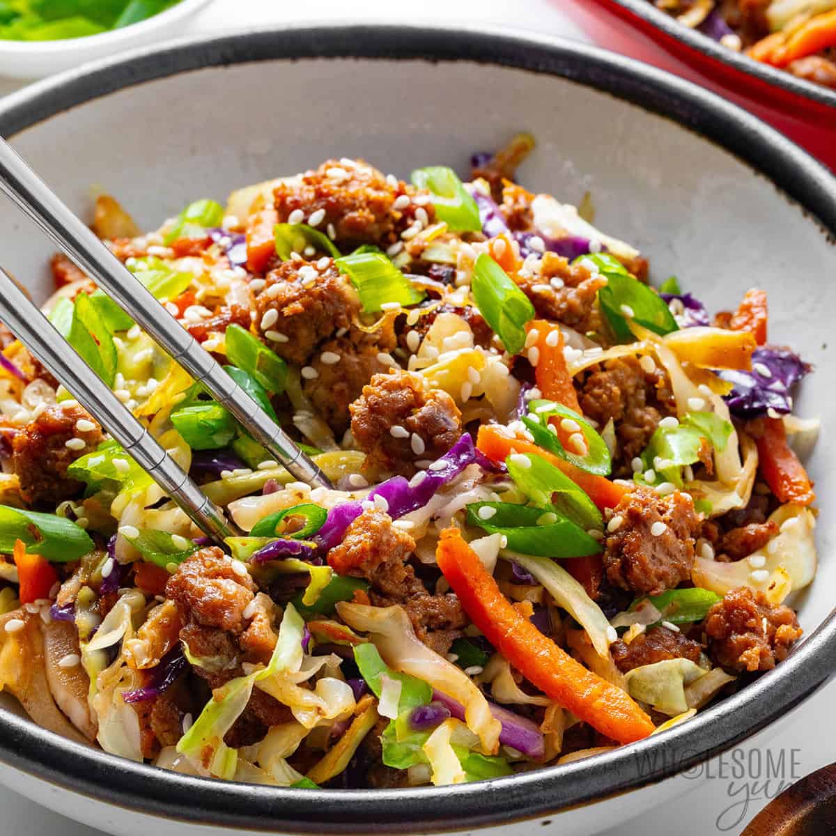 Egg roll in a bowl with ground meat, cabbage, carrots, and green onions, gestational diabetes dinner idea
