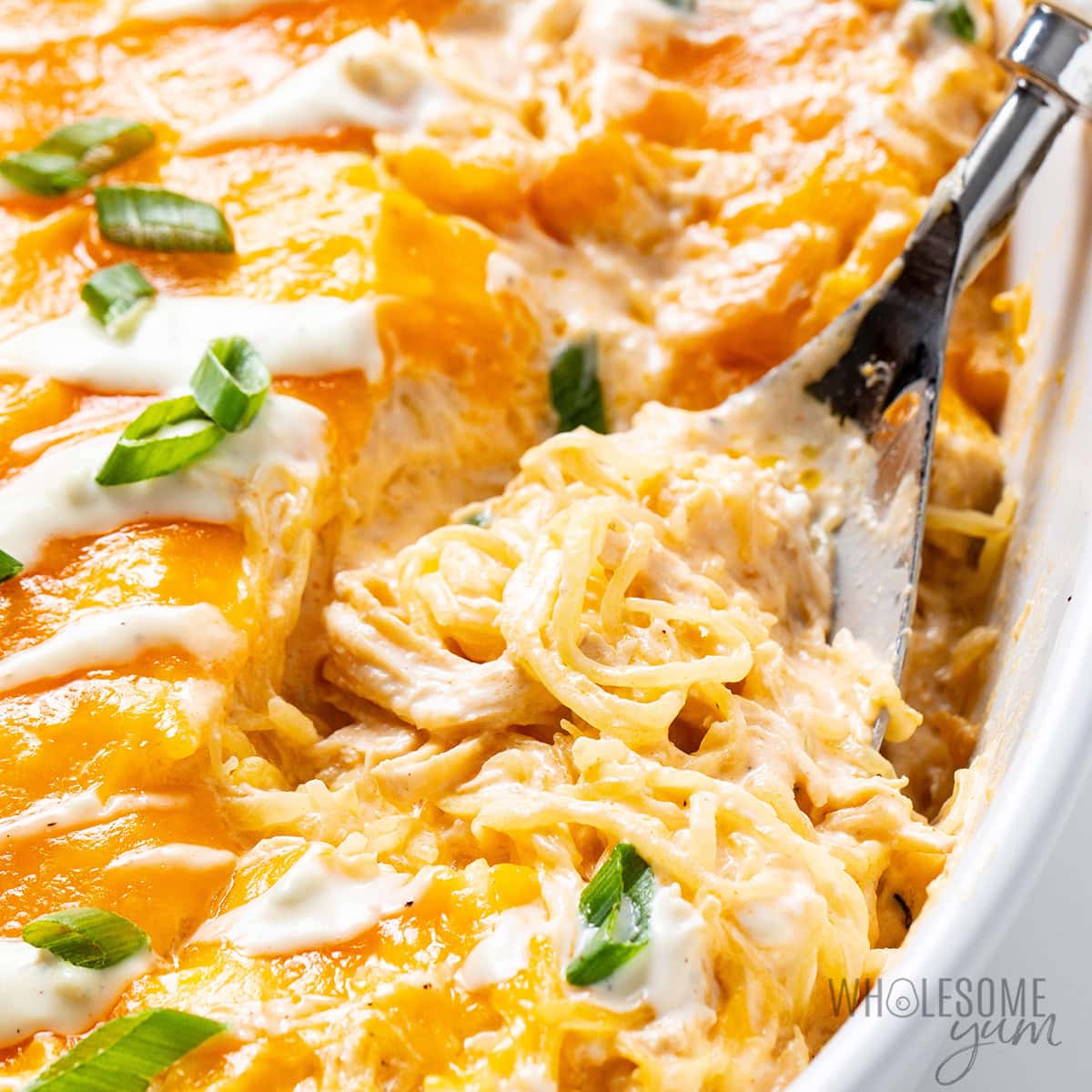 Buffalo chicken spaghetti squash casserole with creamy sauce and melted cheese, gestational diabetes dinner idea.