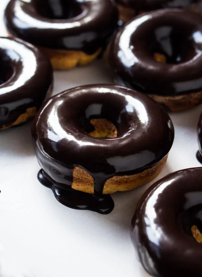 Easy gestational diabetes breakfast consisting of low-carb baked donuts topped with a rich chocolate glaze.