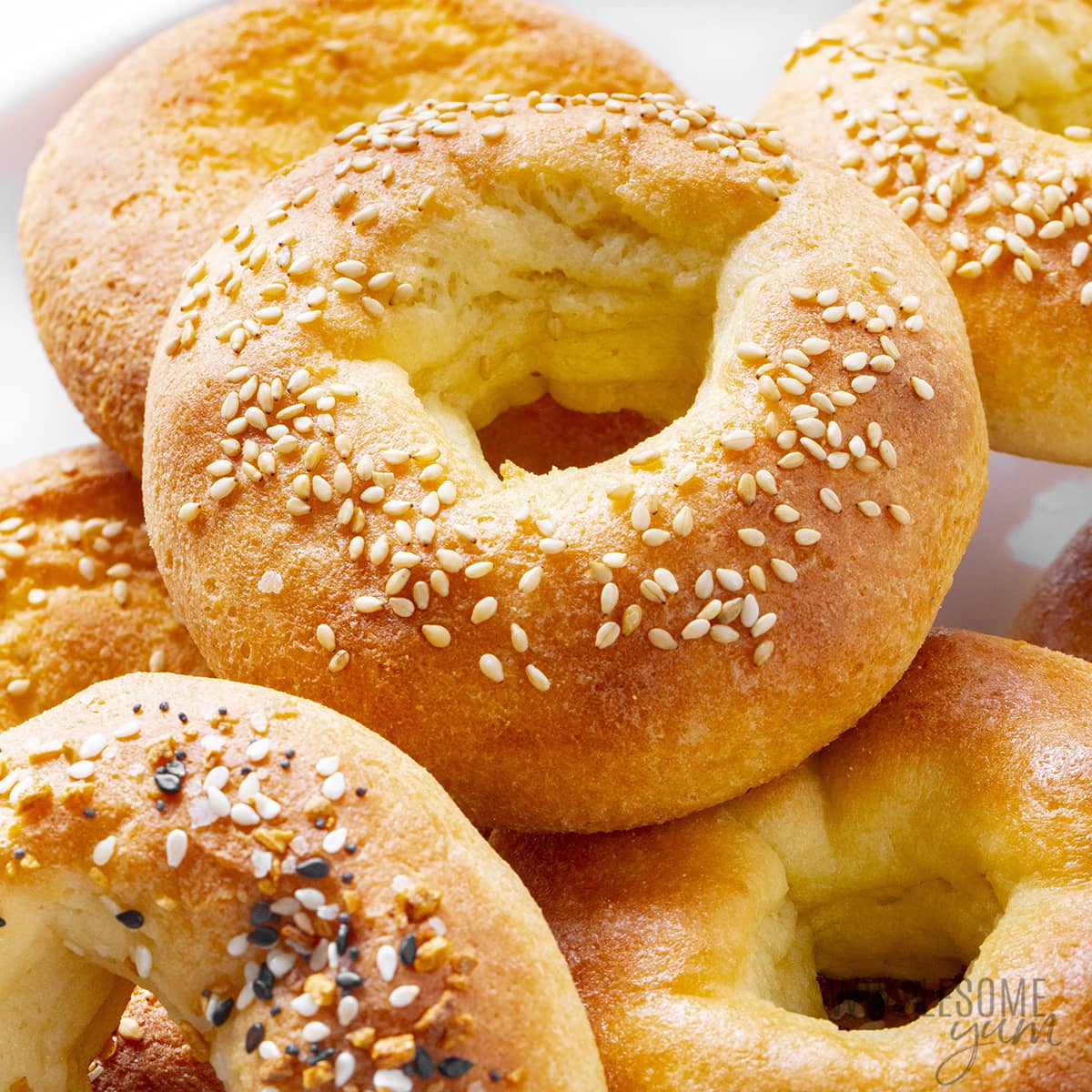 Easy gestational diabetes breakfast consisting of homemade almond flour bagels topped with sesame or everything bagel seasoning.